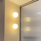 Contemporary Wall Sconce Lighting with Glass Shade and Adjustable Design 4