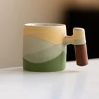 Handmade Ceramic Mug with Wooden Handle – Textured Pottery Coffee Cup in Nature-Inspired Colors 8