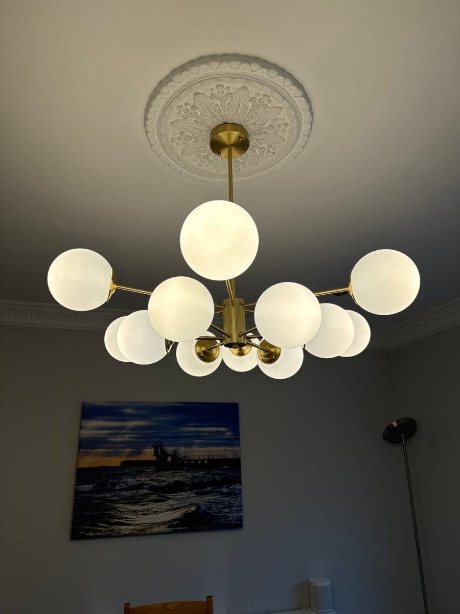 Modern 12-Light Brass Chandelier with Opal Globe Shades and Adjustable Cord 1