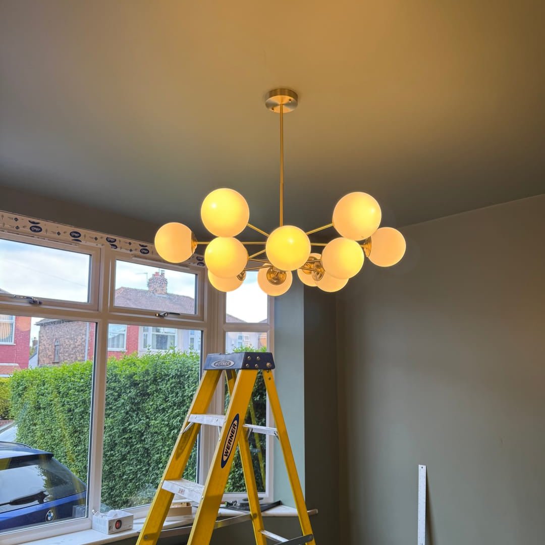 Modern 12-Light Brass Chandelier with Opal Globe Shades and Adjustable Cord 5