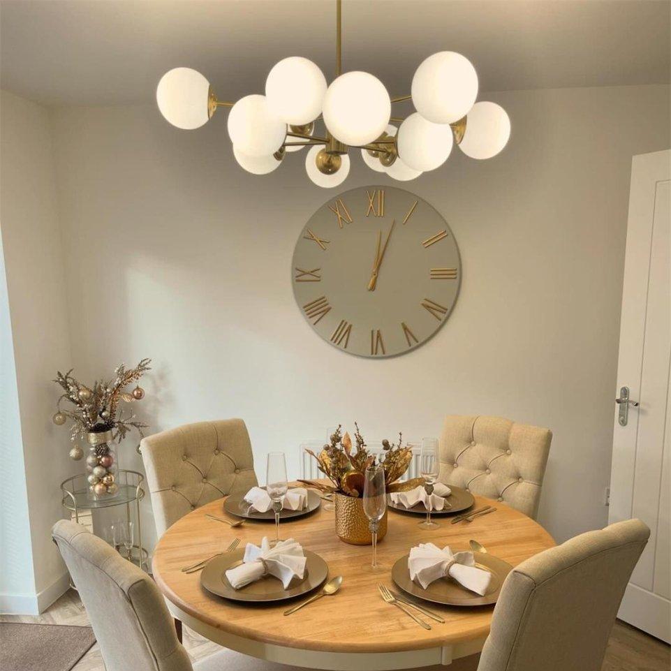 Modern 12-Light Brass Chandelier with Opal Globe Shades and Adjustable Cord 6