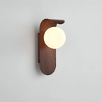 Wall Sconce with Wood Accent and Globe Shade for Modern Interiors 1