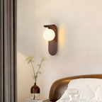 Wall Sconce with Wood Accent and Globe Shade for Modern Interiors 2