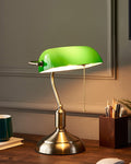 Emerald green glass shade banker table lamp with polished brass base