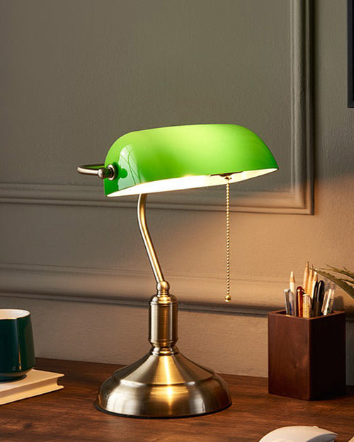 Emerald green glass shade banker table lamp with polished brass base