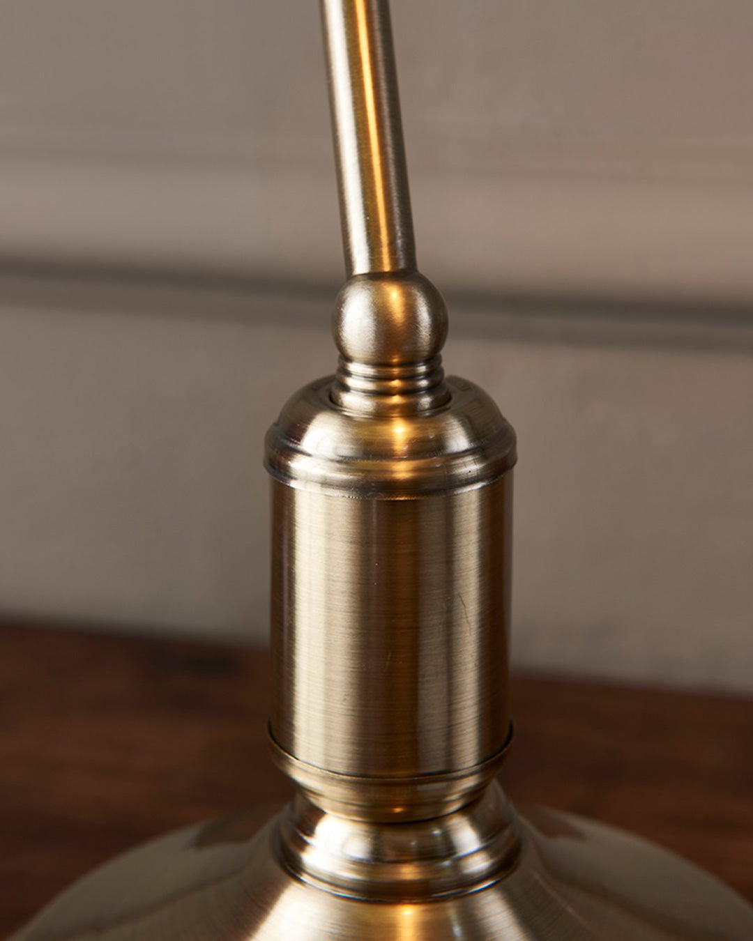 Banker table lamp emerald green shade casting warm desk lighting