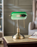 Overhead angle of emerald green banker table lamp polished brass base